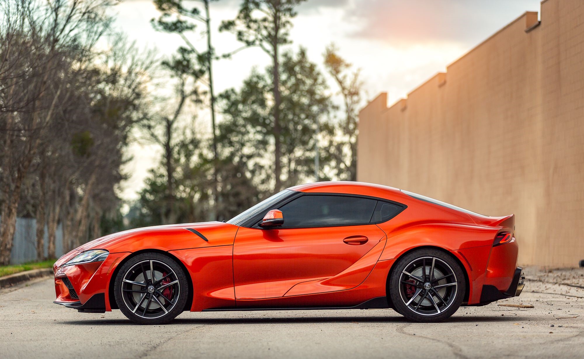Toyota Supra car model wrapped in a glossy firey orange colored vinyl car wrap. Super glossy "Firey Orange" Toyota Supra wrapped by Jacksonville Florida's vinyl car wrap pros at <a href="http://www.wrapsdirect.com">Wraps Direct</a>.