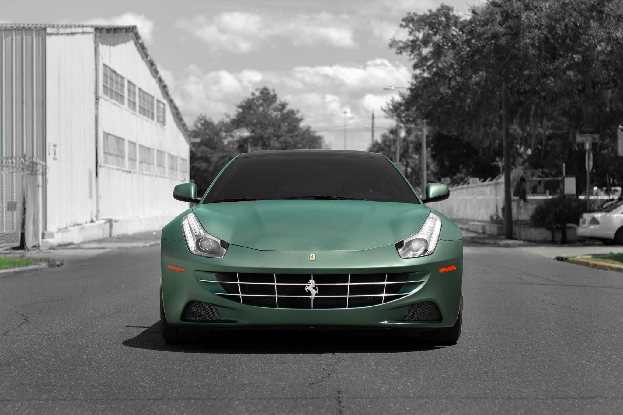 Front of Ferrari car model wrapped in a light Matte Green colored vinyl car wrap. Smoothest "Matte Green" Ferrari wrapped by the vinyl car wrap experts at <a href="http://www.wrapsdirect.com">Wraps Direct</a> in Jacksonville Florida.
