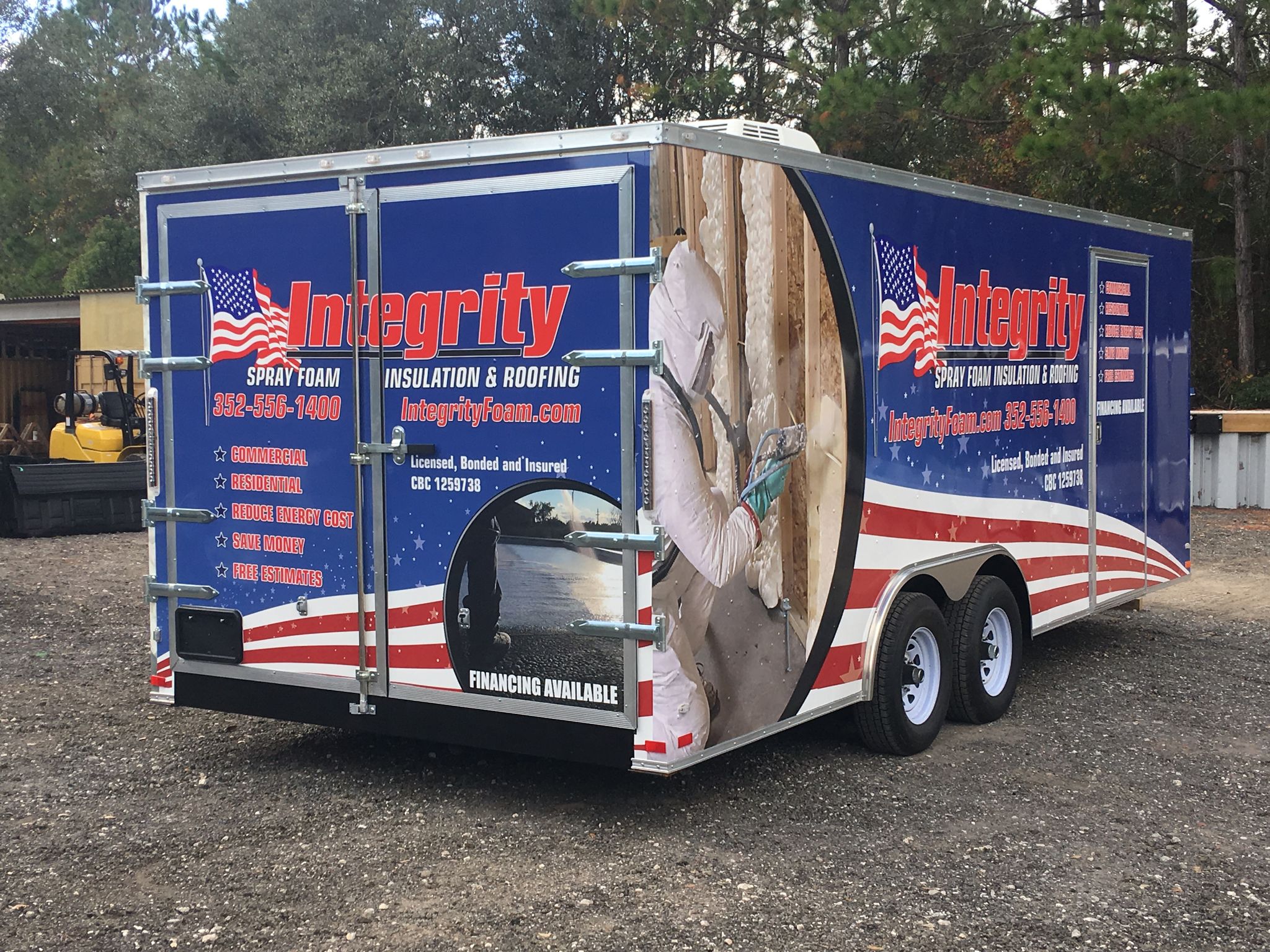Large commercial two-wheel trailer, wrapped in a custom american flag glossy vinyl trailer wrap. "Integrity" American Flag trailer wrap, designed by Wraps Direct in Jacksonville Florida.