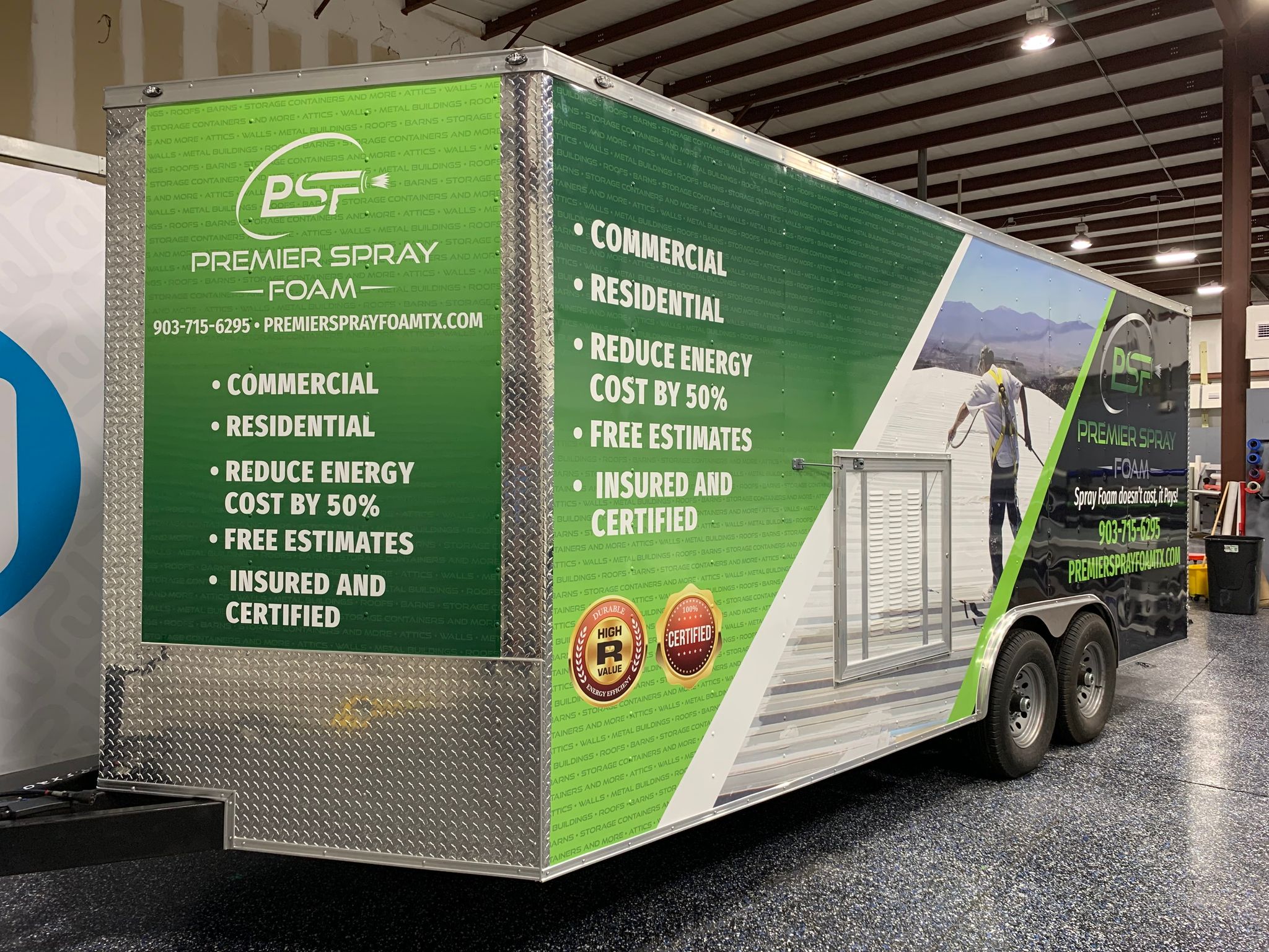 Large commercial two-wheel trailer, wrapped in a customized glossy green vinyl trailer wrap. Custom "Premier Spray Foam" commercial trailer wrap application, innovated by Jacksonville Florida's Wraps Direct.